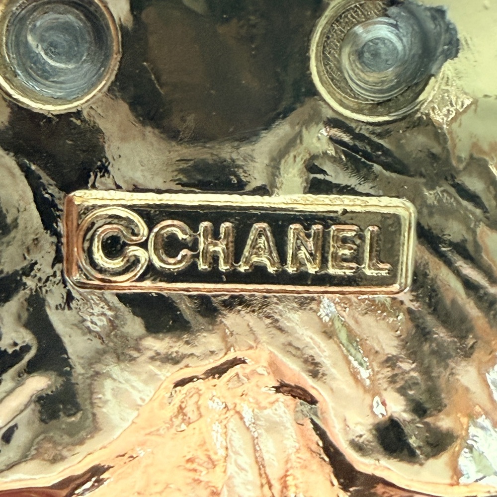 Chanel EUC Gold Tone bracelet
Camellia Enamel 3D charm on 7” 
Stainless Figaro - Picture 2 of 9